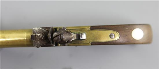 A pair of brass framed and barrelled flintlock boxlock pocket pistols, 8in. (11in with bayonet)